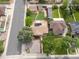 Overhead aerial view shows the house, backyard, storage building, and surrounding neighborhood at 2690 Magnolia St, Denver, CO 80207