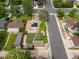 Features include solar panels, green lawn with stone path and detached garage at 2690 Magnolia St, Denver, CO 80207