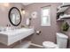 Stylish bathroom features a modern sink, floating shelves, and neutral color scheme at 2690 Magnolia St, Denver, CO 80207