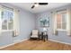 Inviting bedroom with natural light, neutral tones, and hardwood floors at 2690 Magnolia St, Denver, CO 80207