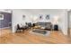 Inviting living room with hardwood floors, sofa, chairs and an open concept design at 2690 Magnolia St, Denver, CO 80207