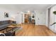 Bright, open floorplan seamlessly connects the living area with the dining room and kitchen at 2690 Magnolia St, Denver, CO 80207
