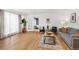 Bright living room with hardwood floors, neutral colors, and comfortable seating area at 2690 Magnolia St, Denver, CO 80207