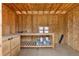 Interior view of shed revealing a workbench and exposed wooden walls at 2690 Magnolia St, Denver, CO 80207