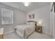 Inviting bedroom with a soft, neutral palette and ample natural light at 8839 Culebra St, Arvada, CO 80007