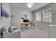 Bright office featuring a modern desk setup, comfortable seating, and natural light at 8839 Culebra St, Arvada, CO 80007