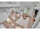 Open-concept living room with modern decor, comfortable sofas, and lots of light at 8839 Culebra St, Arvada, CO 80007