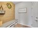 Inviting mud room with a built-in bench, storage, and decorative accents at 8839 Culebra St, Arvada, CO 80007