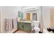 Bathroom featuring a shower and vanity with a neutral color scheme at 1070 Milo Cir # B, Lafayette, CO 80026