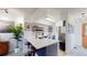 Well-lit kitchen featuring a breakfast bar, modern appliances, and stylish backsplash at 1070 Milo Cir # B, Lafayette, CO 80026