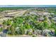 Charming neighborhood featuring tree-lined streets, well-maintained homes, and proximity to highways and commercial areas at 962 S Potomac Way, Aurora, CO 80012