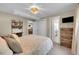 Finished basement bedroom featuring a full closet and adjacent bathroom at 962 S Potomac Way, Aurora, CO 80012