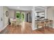 Bright dining area with access to the backyard, conveniently located next to the modern kitchen at 962 S Potomac Way, Aurora, CO 80012