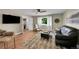 Spacious living room with neutral tones, plush seating, and modern accents throughout at 962 S Potomac Way, Aurora, CO 80012