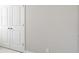 Bright bedroom with white trim and bi-fold closet doors at 21234 E 63Rd Dr, Aurora, CO 80019