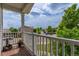 Balcony view of the neighborhood, trees, and clear sky at 249 Vista Blvd, Brighton, CO 80603