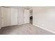 Bedroom featuring neutral walls, carpet, closet and door to another room at 249 Vista Blvd, Brighton, CO 80603