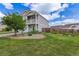 Beautiful home with a front yard and balcony, showcasing curb appeal at 249 Vista Blvd, Brighton, CO 80603