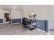 Upstairs office with desk, shelving, and views into other rooms at 249 Vista Blvd, Brighton, CO 80603