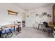 Craft room with sewing tables, storage, and cork board at 249 Vista Blvd, Brighton, CO 80603