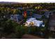 Aerial view of home showcases lush landscaping, modern design, and spacious lot at 5969 S Humboldt Ct, Centennial, CO 80121