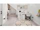 Bright basement features a desk and storage space under the stairs at 5969 S Humboldt Ct, Centennial, CO 80121