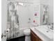 Bathroom features walk-in shower, commode, and sink with vanity at 5969 S Humboldt Ct, Centennial, CO 80121