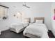 Bright bedroom with two twin beds, a ceiling fan, and decorations at 5969 S Humboldt Ct, Centennial, CO 80121