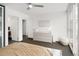 Bright bedroom with modern furnishings, neutral color palette, and ample natural light at 5969 S Humboldt Ct, Centennial, CO 80121