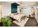 Serene bedroom featuring stylish decor, unique wall art, and sliding doors to a private outdoor space at 5969 S Humboldt Ct, Centennial, CO 80121