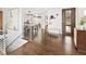 Inviting entryway showcasing hardwood floors, modern decor, and a view into the dining and living areas at 5969 S Humboldt Ct, Centennial, CO 80121
