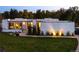 Stunning modern home features lush lawn, minimalist landscaping and stylish architectural details at 5969 S Humboldt Ct, Centennial, CO 80121