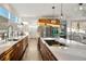 Bright, open kitchen featuring modern cabinetry, stainless steel appliances, and a large island at 5969 S Humboldt Ct, Centennial, CO 80121