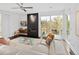 The cozy living room features a modern fireplace and sliding glass doors to the balcony at 5969 S Humboldt Ct, Centennial, CO 80121