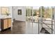 Open living space with hardwood floors, large sliding doors, and stylish decor, leading to the backyard patio at 5969 S Humboldt Ct, Centennial, CO 80121