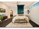 Calm main bedroom featuring a king-size bed, natural light, and a modern accent wall at 5969 S Humboldt Ct, Centennial, CO 80121