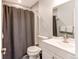 This bathroom includes tile surround, and chrome fixtures at 2870 S Ursula St, Aurora, CO 80014