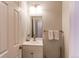 Bathroom with storage space under the sink and a chrome faucet at 2870 S Ursula St, Aurora, CO 80014