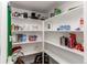 Walk-in pantry featuring spacious shelving for organized storage at 2870 S Ursula St, Aurora, CO 80014