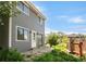 Two-story home featuring a patio area, a well-maintained yard, and a charming garden at 3740 Iris Ave # B, Boulder, CO 80301