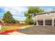 Exterior view of the home with a two car garage, and well maintained lawn at 3740 Iris Ave # B, Boulder, CO 80301