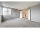 Carpeted bedroom with a window and closet at 4750 S Dudley St # 7, Littleton, CO 80123