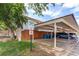 Community carport with parking and refuse area in a well-maintained neighborhood at 1977 S Oakland Way, Aurora, CO 80014