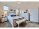 Comfortable bedroom with vaulted ceilings, soft carpet, and ample natural light from multiple windows at 1335 Villa Grv # 30, Monument, CO 80132