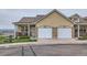 Charming townhome featuring a two-car garage and inviting front porch with views at 1335 Villa Grv # 30, Monument, CO 80132