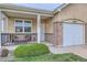 Cozy front porch with outdoor seating, perfect for relaxing and enjoying the neighborhood at 1335 Villa Grv # 30, Monument, CO 80132