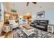 Open-concept living room with dining area, seamlessly blending comfort and style at 1335 Villa Grv # 30, Monument, CO 80132