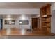 Basement bar area with wooden countertop, sink, and cabinetry, perfect for entertaining guests at 2045 Pine Wood Rd, Sedalia, CO 80135