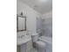 Bathroom featuring pedestal sink, toilet, and shower with marble tiles at 2045 Pine Wood Rd, Sedalia, CO 80135