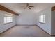 Bedroom featuring vaulted ceilings, ceiling fan, and neutral carpet at 2045 Pine Wood Rd, Sedalia, CO 80135